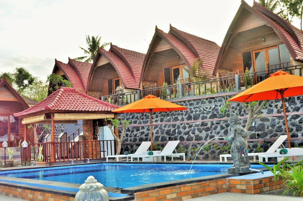 Номер (Бунгало Делюкс с видом на море) парк-отеля Surya Chandra Beach Bungalow, Нуса Пенида