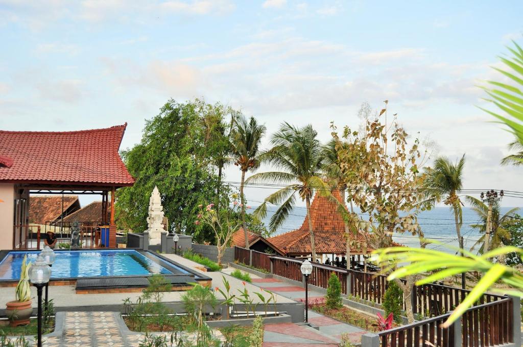 Номер (Бунгало Делюкс с видом на море), Surya Chandra Beach Bungalow