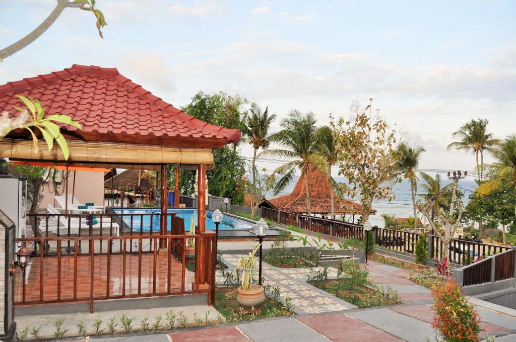 Номер (Бунгало Делюкс с видом на море), Surya Chandra Beach Bungalow