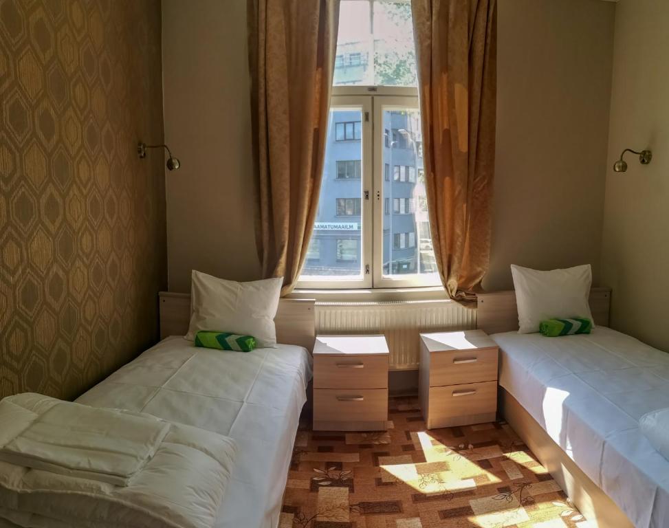 Номер (Односпальная кровать в общем номере для женщин) хостела Villa Kadriorg Hostel, Таллин