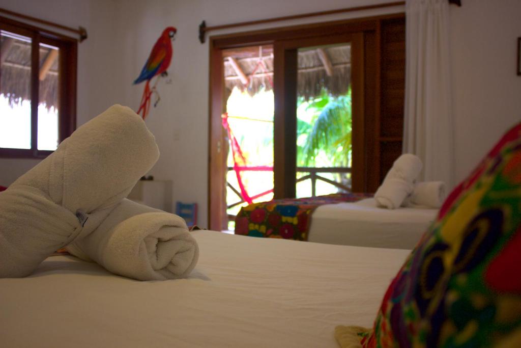 Четырехместный (Четырехместный номер эконом-класса) отеля Hotel Casa Iguana Holbox, Холбокс
