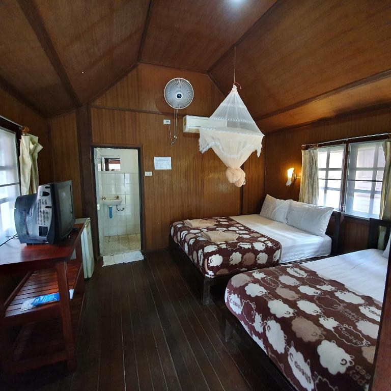 Двухместный (Улучшенный двухместный номер с 1 кроватью или 2 отдельными кроватями и видом на сад) курортного отеля Silver Sand Koh Tao, Ко Тао