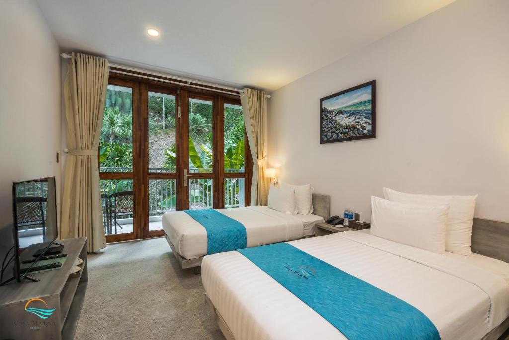 Двухместный (Двухместный номер с 2 отдельными кроватями, вид на сад) курортного отеля Casa Marina Resort, Куинён