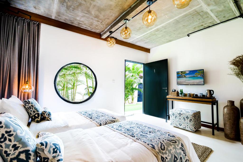 Двухместный (Улучшенный двухместный номер с 1 кроватью или 2 отдельными кроватями и видом на сад) отеля Body Factory Bali, Чангу