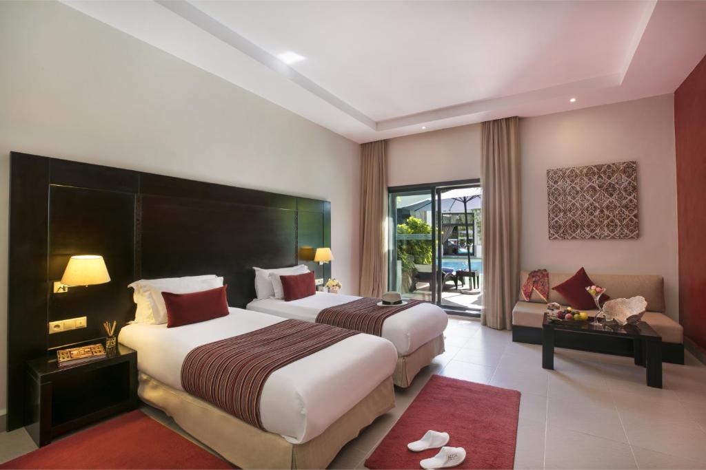 Двухместный (Улучшенный двухместный номер с 1 кроватью и видом на бассейн) отеля Kech Boutique Hotel & Spa, Марракеш