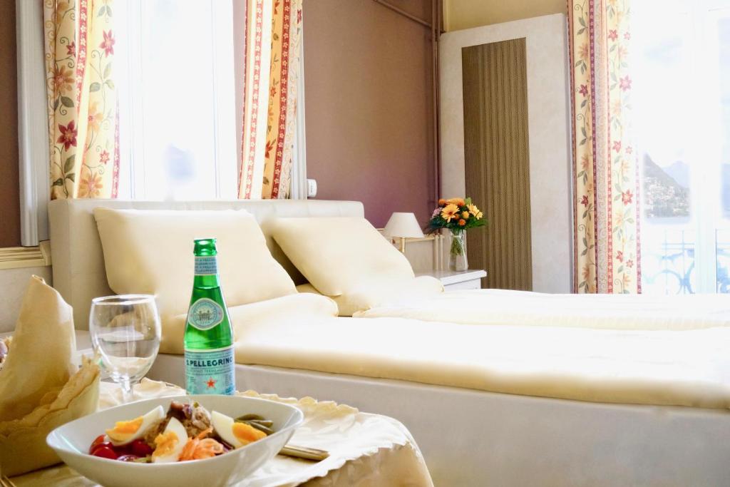 Двухместный (Двухместный номер с 1 кроватью, вид на озеро) отеля Hotel Victoria, Лугано