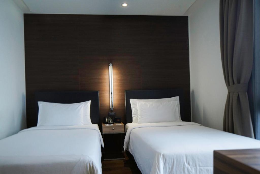 Сьюит (Двухуровневый люкс с 3 спальнями) отеля LiT BANGKOK Residence, Бангкок