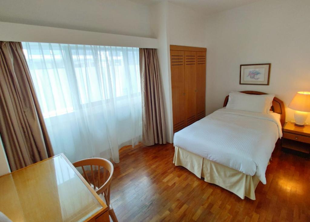 Апартаменты (2 Deluxe Suite) апарт-отеля Orchard Point Serviced Apartments, Сингапур (город)