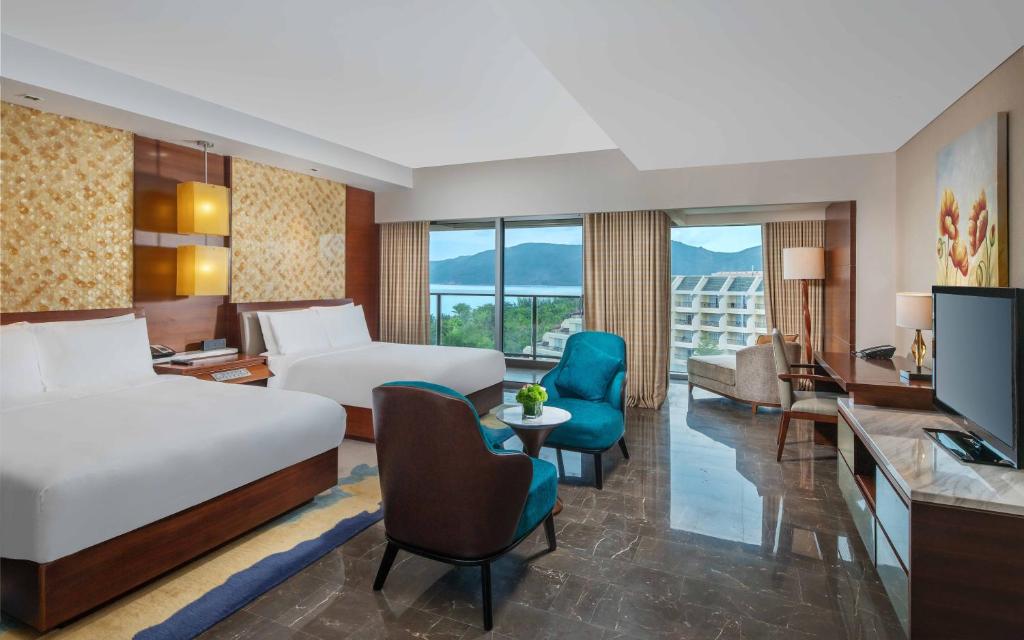 Сьюит (Люкс с двумя спальнями и видом на океан (доступ к представительскому VIP-бассейну)) курортного отеля MGM Grand Sanya, Санья