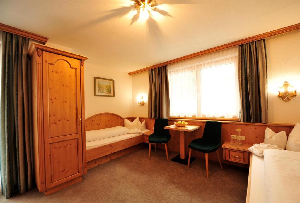 Двухместный (Стандартный двухместный номер с 2 отдельными кроватями) отеля Hotel Verwall, Ишгль