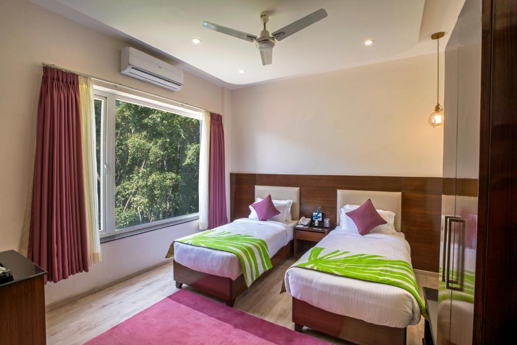 Двухместный (Двухместный номер Делюкс с 2 отдельными кроватями) отеля Regenta Inn On The Ganges Rishikesh, Ришикеш