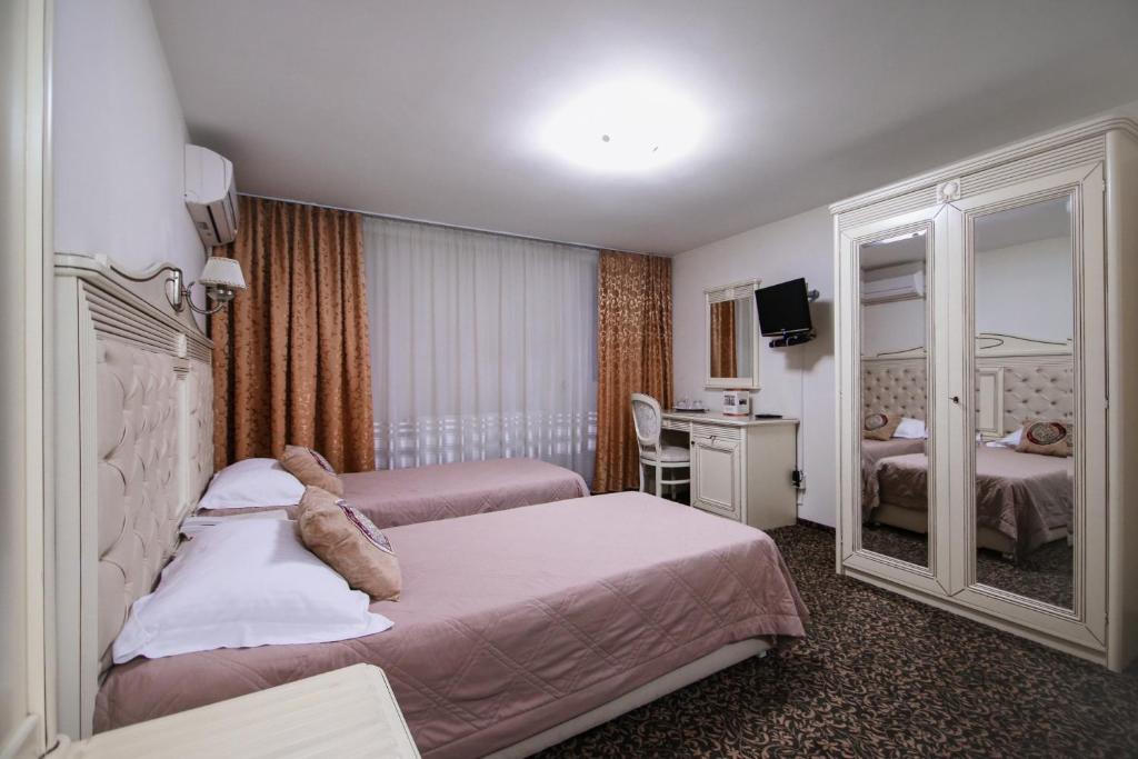 Двухместный (Стандартный двухместный номер с 2 отдельными кроватями) отеля Hotel Royal Craiova, Крайова