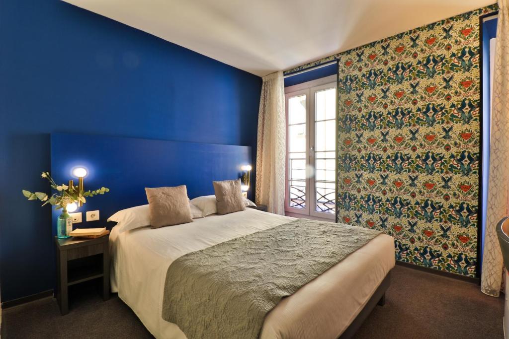 Двухместный (Небольшой двухместный номер с 1 кроватью) отеля Hôtel Le Genève, Ницца