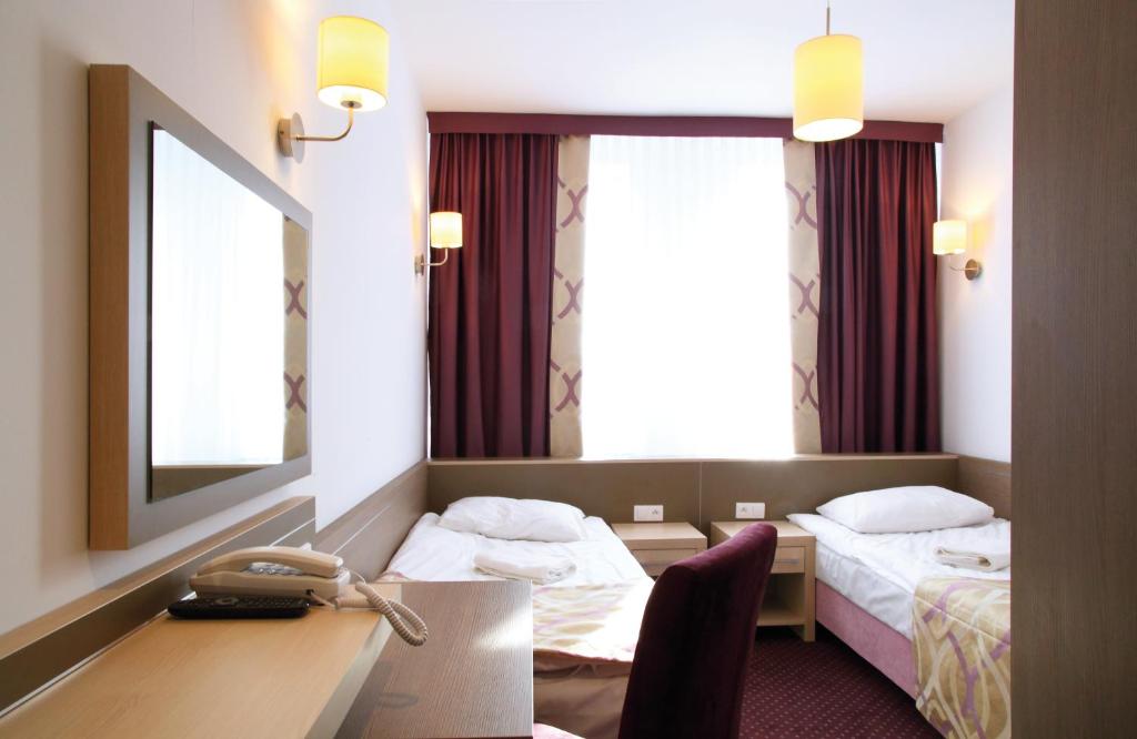Двухместный (Двухместный номер с 2 отдельными кроватями) отеля Hotel Arche, Седльце