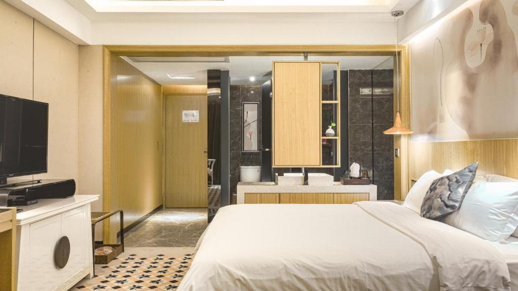 Двухместный (Номер Делюкс с кроватью размера «queen-size»), Paco Hotel - Guangzhou Tianpingjia Metro Branch