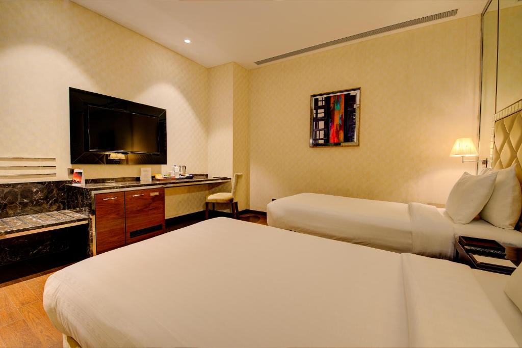 Двухместный (Двухместный номер «Премиум» с 2 отдельными кроватями) отеля Niranta Transit Hotel Terminal 2 Arrivals/Landside, Мумбай