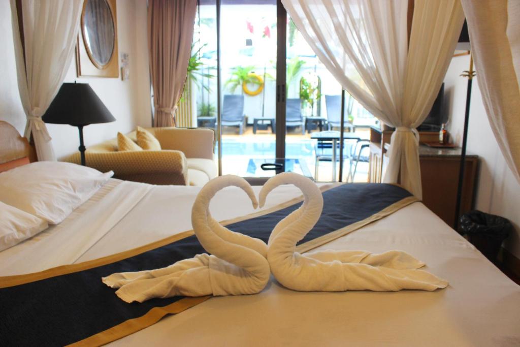 Двухместный (Двухместный номер Делюкс с 1 кроватью или 2 отдельными кроватями, доступ к бассейну) отеля Orchid Hotel and Spa Kalim Bay, Пхукет