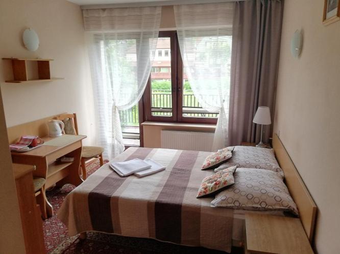 Двухместный (Двухместный номер с 1 кроватью и балконом) семейного отеля Arnika Wynajem Pokoi, Закопане