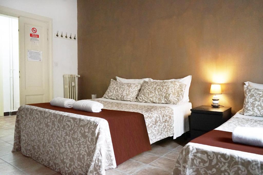 Трехместный (Трехместный номер с основными удобствами и общей ванной комнатой) гостевого дома Hosting Flats Guest House, Рим
