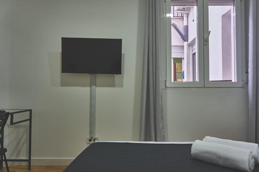 Двухместный (Двухместный номер с 1 кроватью и общей ванной комнатой) гостевого дома GS Latina, Мадрид