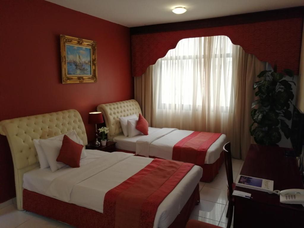 Студио (Люкс Фламинго) апарт-отеля Al Maha Regency Hotel Suites, Шарджа