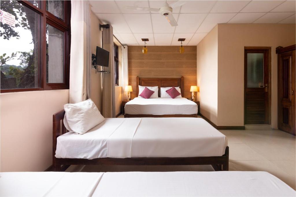 Трехместный (Трехместный номер Делюкс) отеля Piumara Residence, Канди