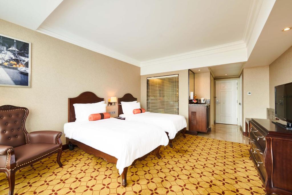 Двухместный (Улучшенный двухместный номер с 1 кроватью или 2 отдельными кроватями) отеля Eastin Grand Hotel Saigon, Хошимин