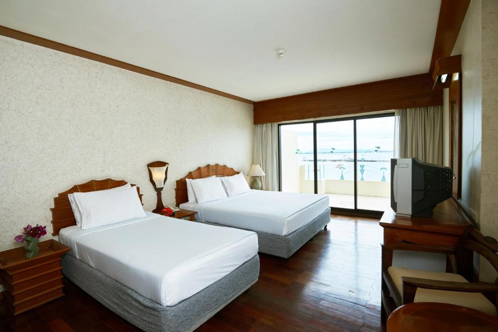 Двухместный (Двухместный номер Делюкс с 1 кроватью или 2 отдельными кроватями и видом на море) курортного отеля Garden Sea View Resort, Паттайя