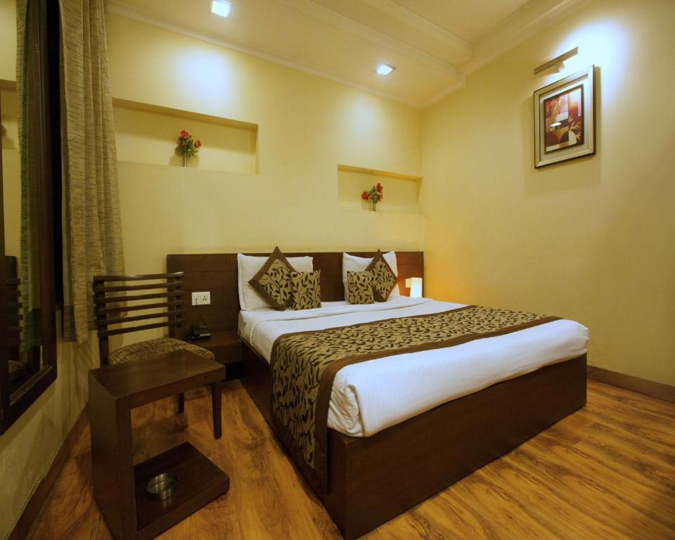 Двухместный (Улучшенный двухместный номер с 1 кроватью или 2 отдельными кроватями) отеля The Pearl- A Royal Residency, Нью-Дели