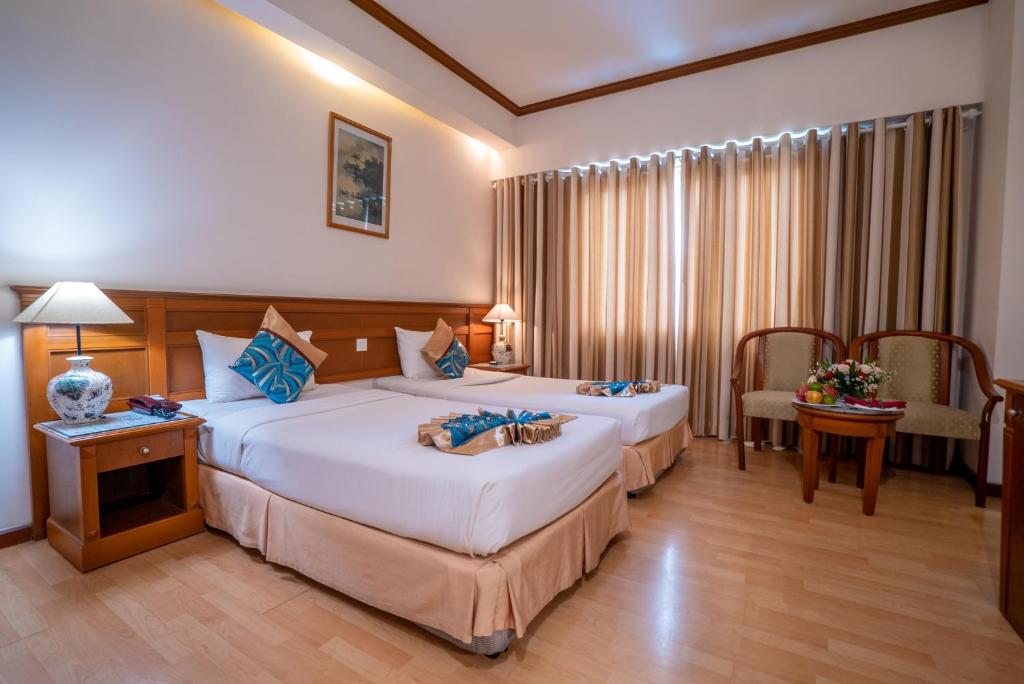 Двухместный (Двухместный номер «Премиум Делюкс» с 1 кроватью или 2 отдельными кроватями) отеля Oscar Saigon Hotel, Хошимин