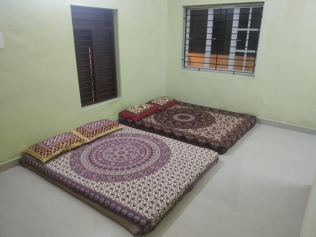 Двухместный (Двухместный номер с 1 кроватью или 2 отдельными кроватями и базовыми удобствами) гостевого дома Xavier Rajan Guest House, Ченнаи