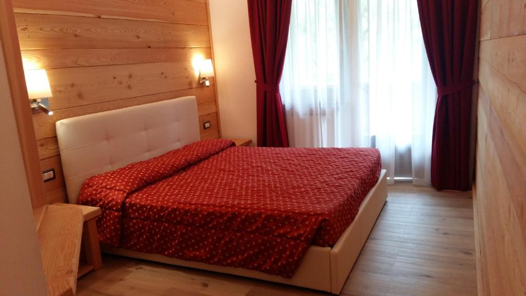 Двухместный (Двухместный номер с 1 кроватью или 2 отдельными кроватями) отеля Albergo Garni Martina, Мадонна-ди-Кампильо