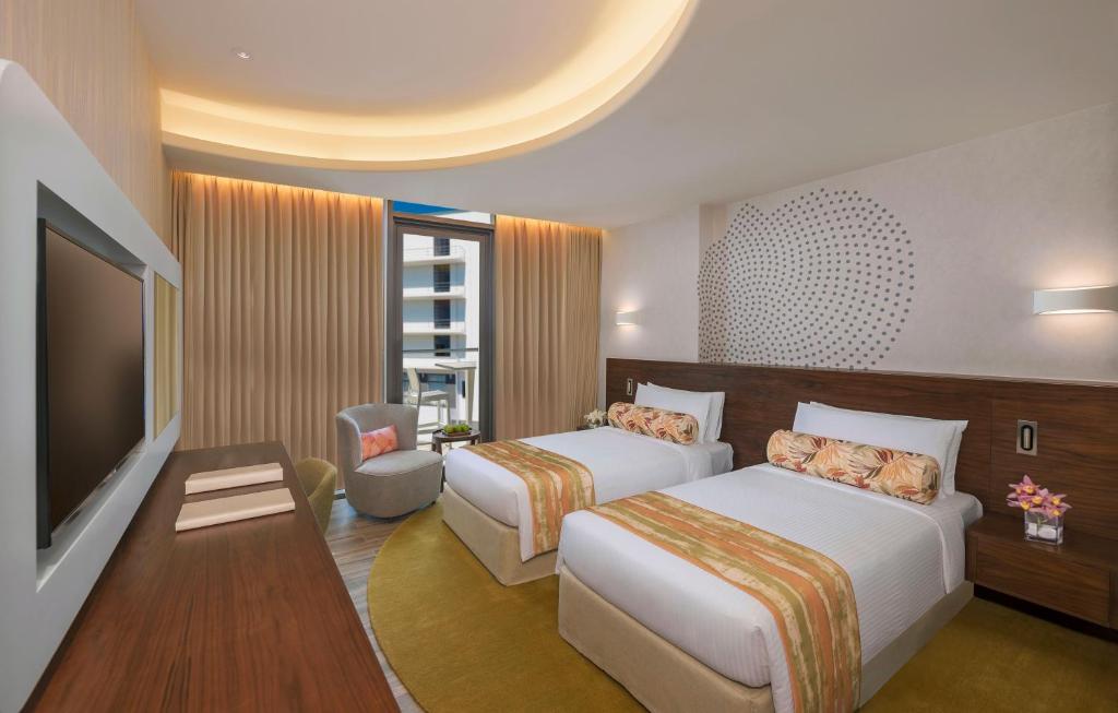 Двухместный (НОМЕР ДЕЛЮКС с балконом и кроватью размера «king-size» или 2 односпальными кроватями) курортного отеля The Retreat Palm Dubai MGallery By Sofitel, Дубай