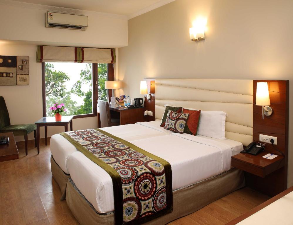 Двухместный (Двухместный номер Делюкс с 1 кроватью или 2 отдельными кроватями) отеля Ahuja Residency Sunder Nagar, Нью-Дели