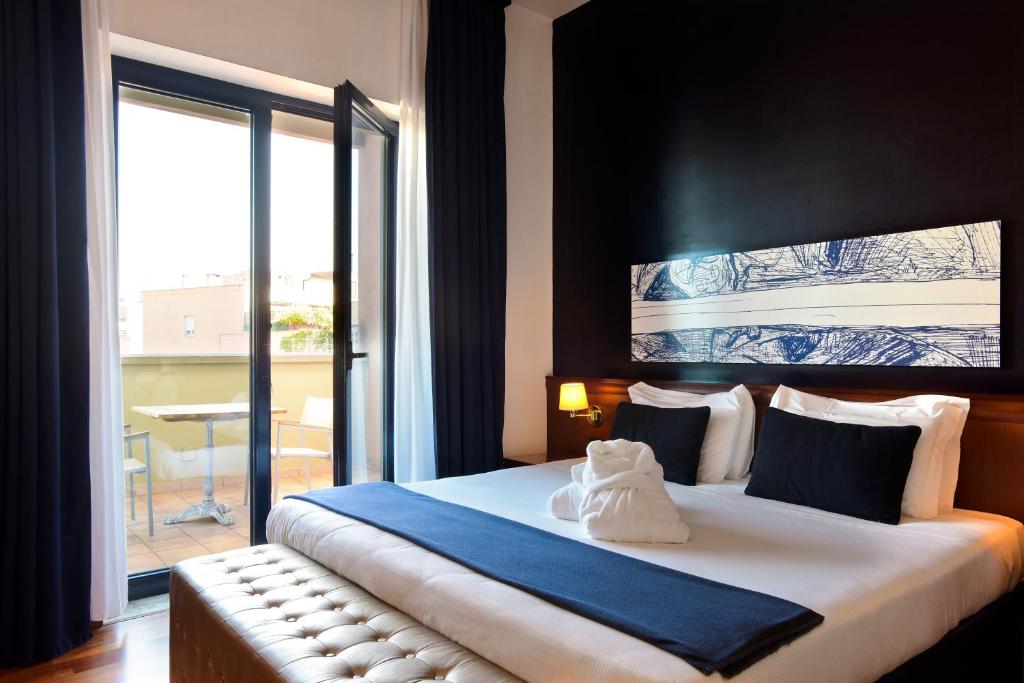 Двухместный (Двухместный номер Делюкс с 1 кроватью и балконом) отеля Grand Hotel Tiberio, Рим
