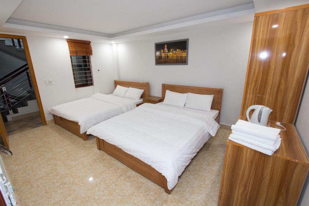Двухместный (Стандартный двухместный номер с 2 двуспальными кроватями) хостела Flaco Hostel, Сапа