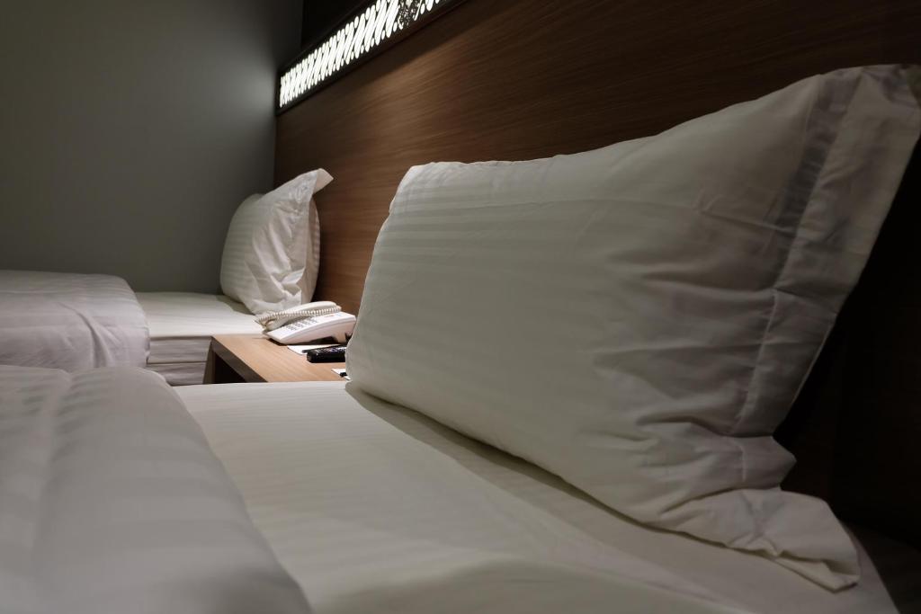 Двухместный (Улучшенный двухместный номер с 1 кроватью или 2 отдельными кроватями) отеля Wirton Seminyak, Денпасар