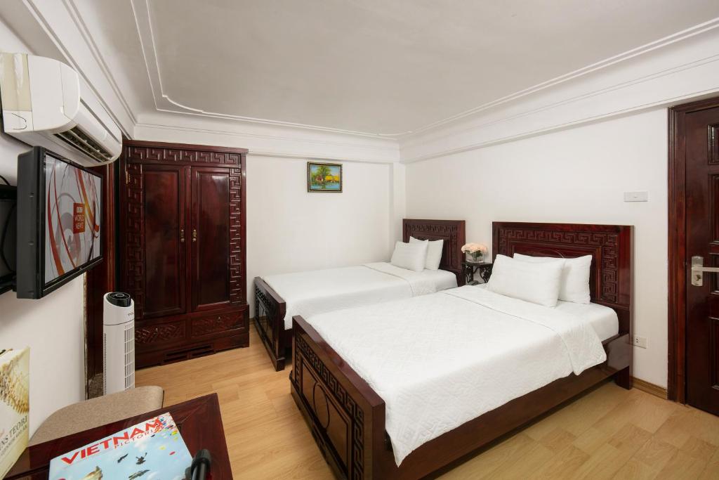 Двухместный (Двухместный номер Делюкс с 2 отдельными кроватями) хостела Little Hanoi Hostel 2, Ханой