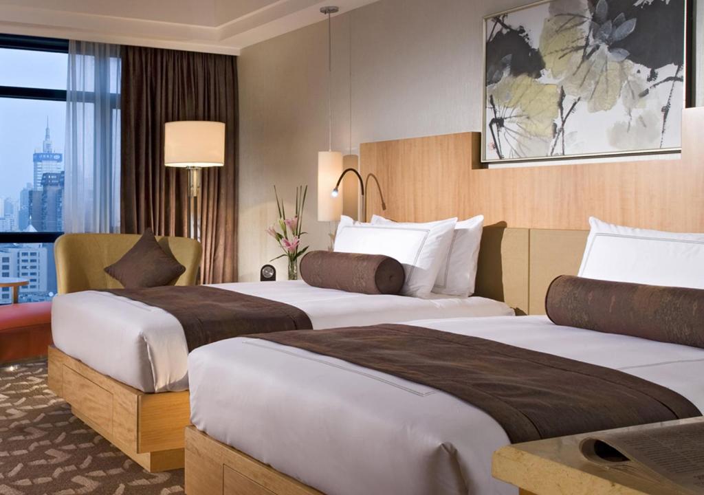 Двухместный (Двухместный номер Swiss Advantage с 2 отдельными кроватями) отеля Swissôtel Grand Shanghai, Шанхай
