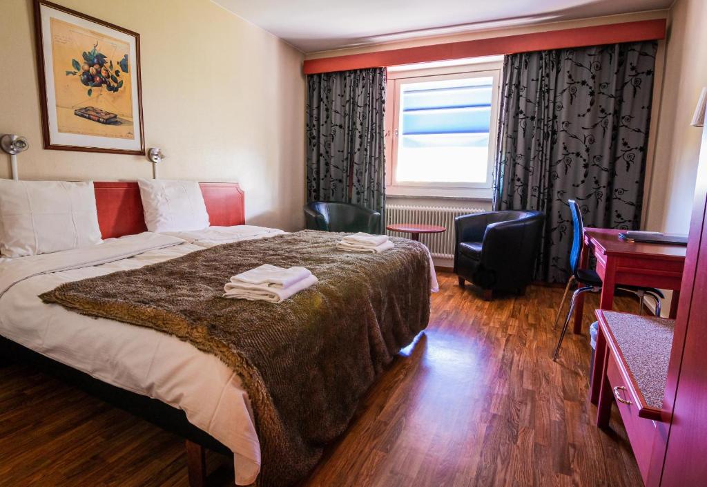Двухместный (Двухместный номер Делюкс с 1 кроватью или 2 отдельными кроватями) отеля Skoogs City BnB, Питео