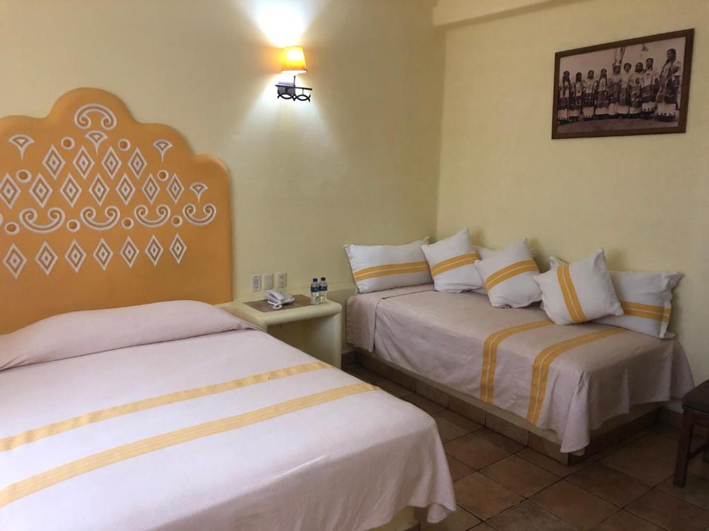 Трехместный (Трехместный номер) отеля Hotel Maria Mixteca, Санта-Крус-Хуатулко