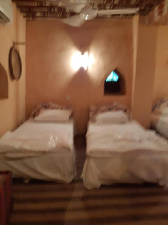 Двухместный (Большой двухместный номер с 1 кроватью или 2 отдельными кроватями) гостевого дома Bait Bahla Hospitality Inn, Низва