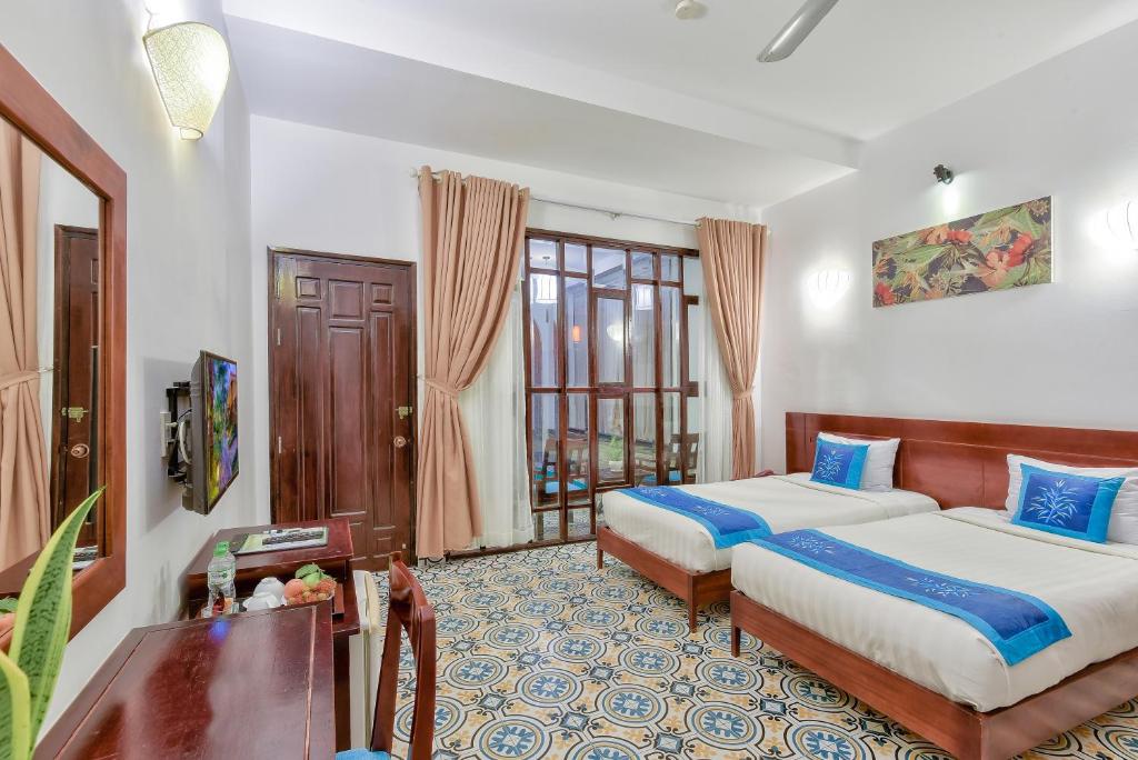 Двухместный (Улучшенный двухместный номер с 1 кроватью или 2 отдельными кроватями) курортного отеля Ravenala Resort, Фантхьет