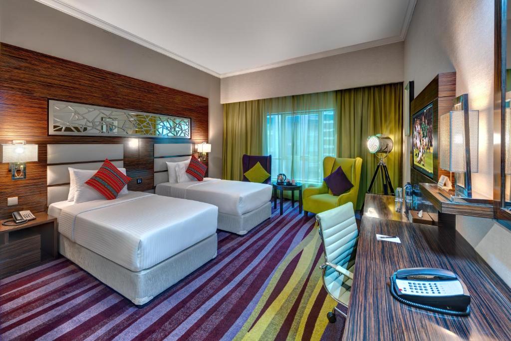 Двухместный (Двухместный номер с 2 отдельными кроватями) апарт-отеля Ghaya Grand Hotel, Дубай