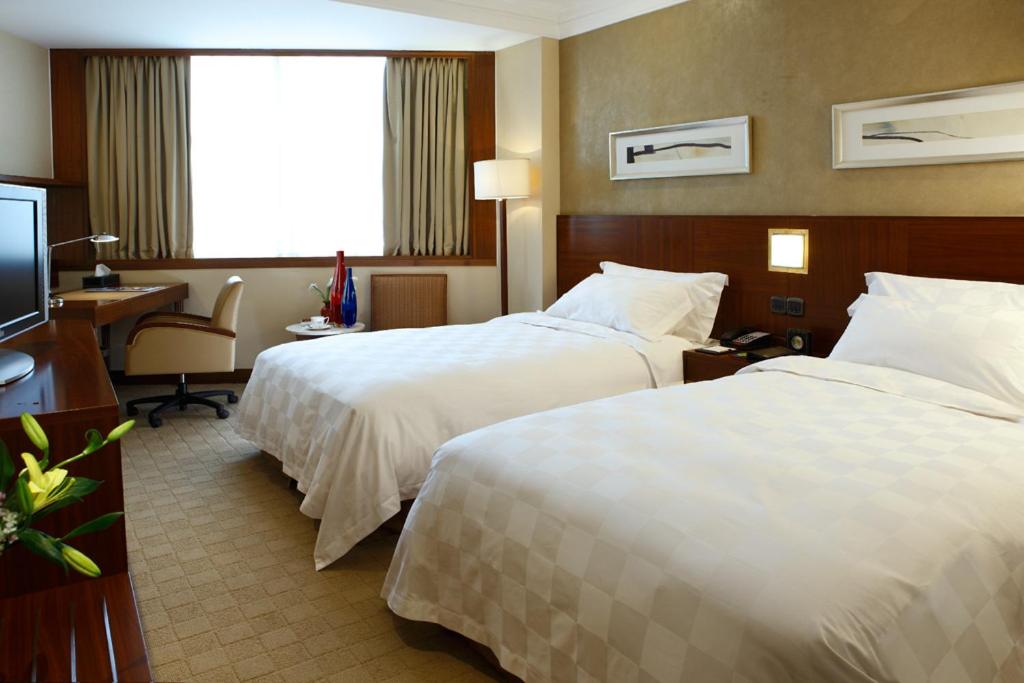 Двухместный (Стандартный двухместный номер с 1 кроватью или 2 отдельными кроватями) отеля San Want Hotel Shanghai, Шанхай