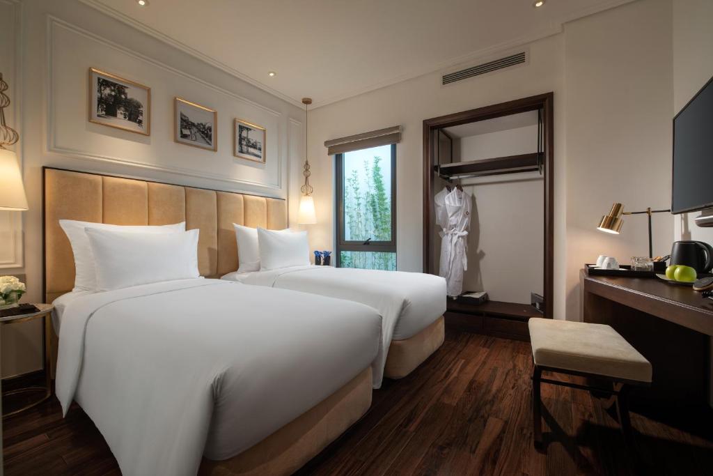Двухместный (Классический двухместный номер с 1 кроватью или 2 отдельными кроватями и окном.) отеля Soleil Boutique Hotel Hanoi, Ханой