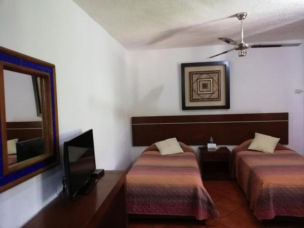 Апартаменты (Двухуровневые апартаменты) апарт-отеля Hotel Los Girasoles, Канкун