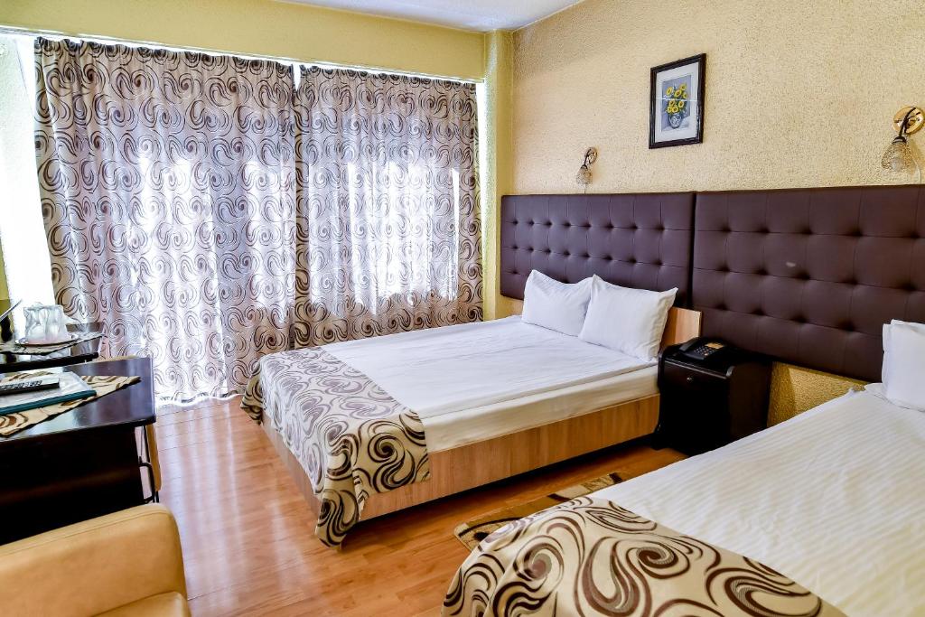 Двухместный (Двухместный номер с 2 отдельными кроватями) мотеля Motel Perla Sigheteana, Сигету-Мармацией