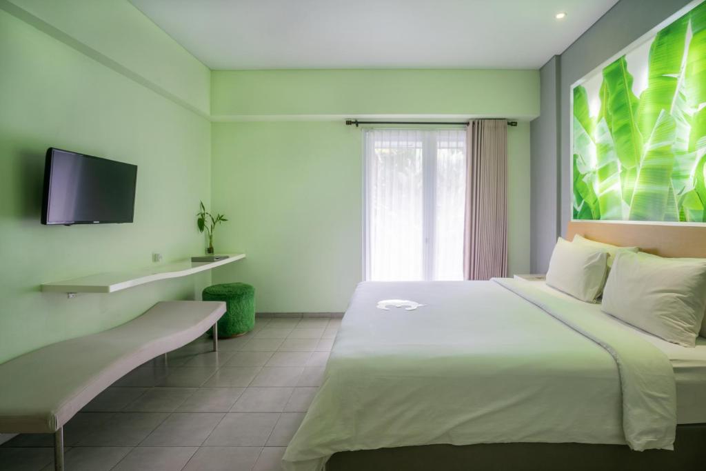 Двухместный (Двухместный номер EDEN Suite с 1 кроватью и балконом) отеля EDEN Hotel Kuta Bali, Кута