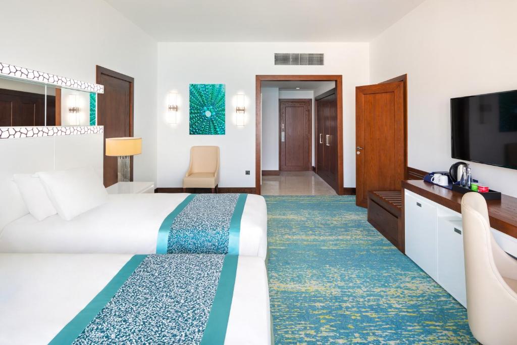 Двухместный (Стандартный двухместный номер с 1 кроватью или 2 отдельными кроватями) отеля JA Ocean View Hotel, Дубай